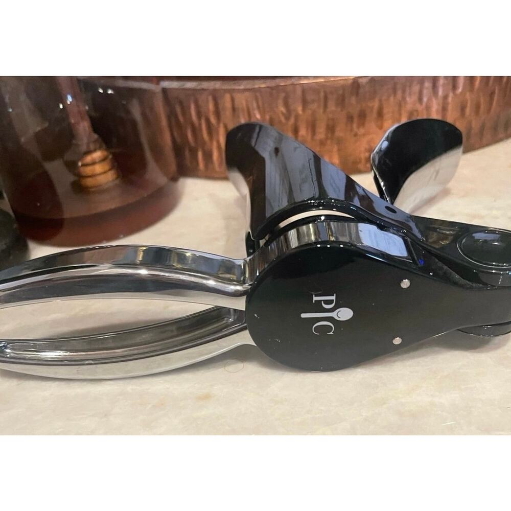 Pampered Chef champagne bottle opener